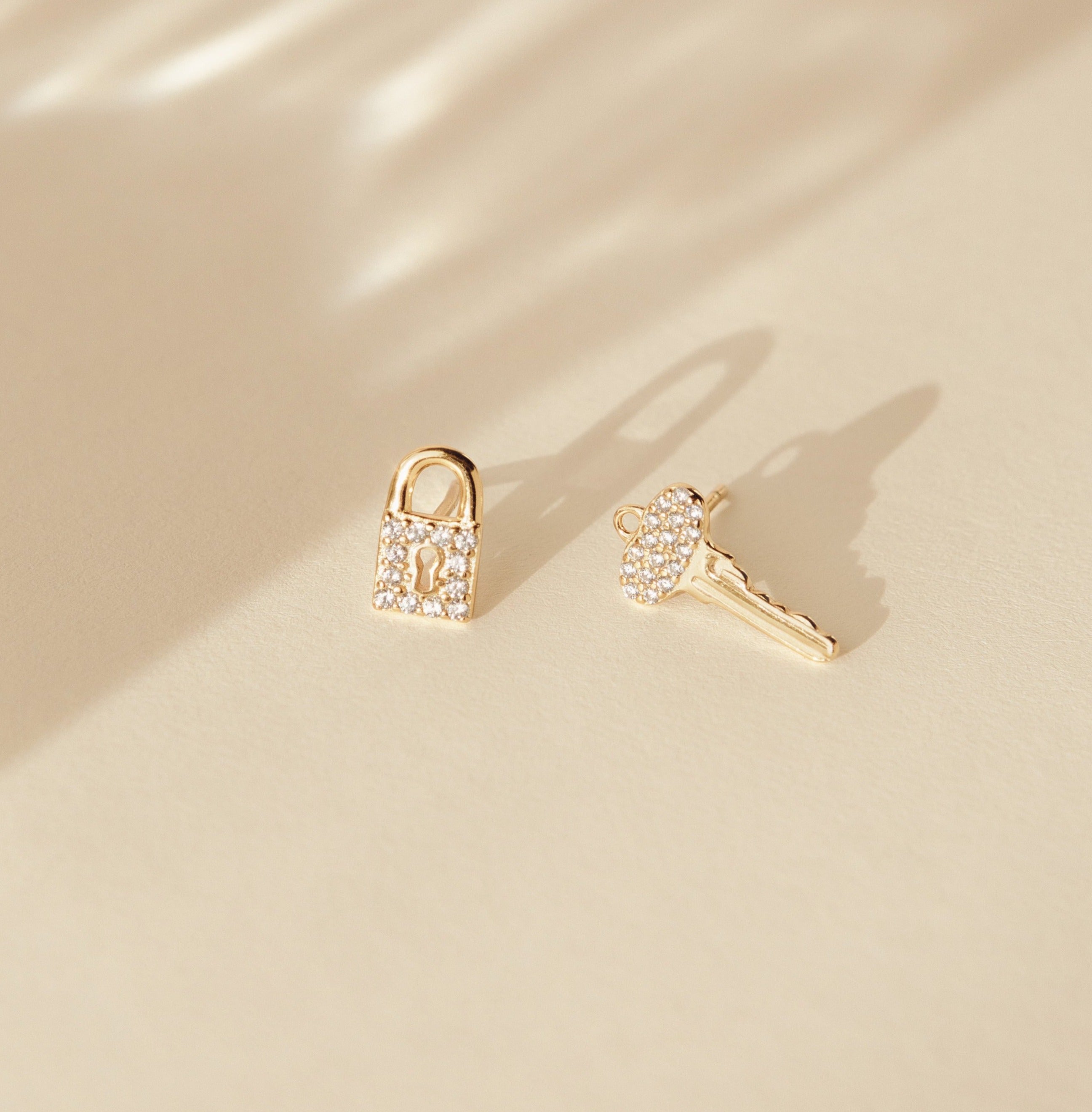Locke Studs With Diamond In Gold Plated.